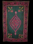 Antique patchwork of woolen material with silk embroidery. Very deep and beautiful colours.
