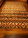  Uzbek Ghadjeri, Early 20th century, large archaic graphic design in natural colours, 376x190cms