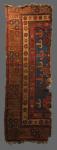 ONE HALF OF A KHOTAN made for the Tibetan market in the classical khaden size, Eastern Turkestan, early 19th century, 147 x 50 cm