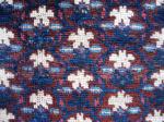 Unusual fragment. I believe it's most of a bagface as the rows of blue knots across the bottom are original. Maybe Baluch, maybe Sistan Afshar. Approx. 14'' x 14''.