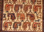  A White Ground Baluch with Botehs