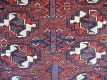 1st half of the 19th century Yomud Chuval. Excellent color and very fine weave. The color of the field is much more purple and saturated than it appears. Missing partial side borders.