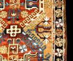 KARAPINAR, Central Anatolia, 

approx 4.2x5.10; Fine example of geometric-style LPH octagons on unusual apricot field. Classic 'quattrefleurs' floral elements of stylized tulips and hyacinths from the Baba Nakkash a1bum. 1800-50. Excellent condition; high pile with localized wear. Original edges, no restoration, heavily oxidized black/brown border. 