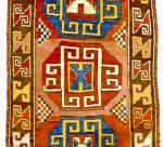 KARAPINAR, Central Anatolia, c. 1800-1850. Extraordinary textbook example of this classic group with huge octagons and interior hooked strapwork in an early geometric Turkic style. Very small areas of expert restoration. Thick lustrous pile with localized wear. Reduced in length. Approx 3.5 x 9.2 feet.