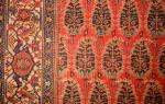  A Rare Farahan Rug on a copper ground, cut and shut