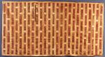 A rare Japanese silk applique kesa (Buddhist priest's robe); c. 1800; approx. 2.10x5.10 feet. The kesa consists of a 21-jo pattern of fine silk strips attached to the brocaded silk ground. The number of strips signifies a high rank in the Soto sect of Zan Buddhism. Fine condition, slight fading. Lined with original fine beige silk, light fraying.