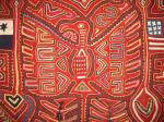   Mola from the cuna ind:ans, san blas island panama, lovely old piece with an eagle, the panama and US banner, some writing including ''Chaime'', using lots of different old textiles and additional embroidery, 90 x 59 cm, 3 x 1.8 ft