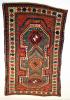 SEVAN PRAYER KAZAK,
Armenia S W Caucasus / Circa 1880-1900

Size: 6'5 x4' (1.98 m x 1.23m)
Condition / Description: A nice small version of the famous large Sevan Kazaks of Armenia. This one has good age, although not in the range of the classic Sevens, The prayer niche and the free drawing of the piece are nice touches. Colors are excellent and deeply saturated. It has long nap, good pile, and almost no restoration. Blue wefted. The nice thing about this rug is that it is not a ''cookie cutter kazak'' made for export, but a piece made for themselves, to be kept and used!

