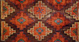  Karakalpak? Kyrgyz? or an odd Baluch with traces of the original brocaded k;l;m ends...who knows? Knot asymmetric open to left; wool is soft lustrous and very silky. The ground aubergine-brown is corroded giving to the pattern a nice relief effect.