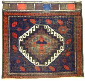  # 764 Very rare Timuri khorjin front, 70/67 cm, mid 19th century, with a never before seen tribal gul in the center, corroded brown and aubergine, but the real magic blue pile is in good condition, no comparable piece is published up to date!
