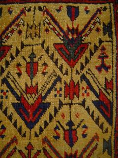  Small Yellow Field Heraldic Lattice Rug, 80 109 cm. All wool, symmetrical knot. Azerbaijan or Shahsavan, 19th century. Very good condition.