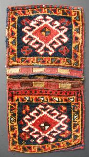 Afshar saddlebags, South Persia, late 19th century. The size of the bags laid flat is 26\