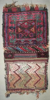  West Persian Tribal Bagface. Kurdish or Luri? In good shape with nice color and the complete flatwoven back. The back is in fact quite attractive and uses both white wool and cotton. The weft structure of the pile bagface incorporates some of this same cotton with the addition of blue, peach and brown wool. The whole piece opened measures 44x84cm (17''x 33'' inches) A very authentic antique tribal weaving at a reasonable price.
<p>I'll be in the San Francisco Bay area all summer. If you are in town and would like to see some rugs (some for sale and some not) please email me. 