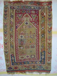  Unusual Antique Anatolian prayer kelim. With repairs and restorations old and less old, (some discolored), still an impressive, rare piece of the authentic ancient tradition.
