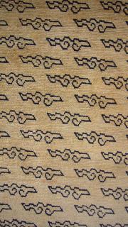 Cloudband tibetan khaden.19th.c.This wonderful rug is in great condition with no repairs and full pile[the dark mark at one end is a shadow]