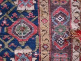 Very damaged Kurdish Mina Khani runner fragment. Missing one end, foundation brittle throughout this is a prime candidate for cutting into smaller fragments and then mounting them. Approx 11' x 3'