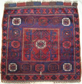  Baluch square middle bagface with a deep red and poly-chromatic blues. 77x79cm(30''x31'' inches'')