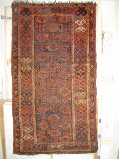  Antique Beshir rug with 3 Stacks of Polygons. Heavy wear, but it\'s all there. Great greens.