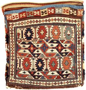 A very good 19c Shahsevan reverse sumak khorjin, tightly woven and with its original back. Playful treatment of the closure panel and clear vegetal colors on an attractive ivory ground.