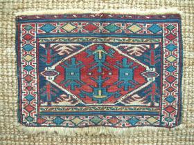 Sumak bag face, likely from a khorjin, 45 x 30 cms, South-eastern Caucasus; uncommon central motifs; mostly countered sumak. 