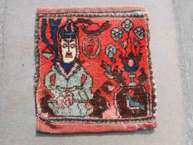  very unusual bagface picturing a Dervish, seated on his leopard skin rug holding his axe and his purse hanging behind in the tree. 
Back is not original has been added later. Colours are mostly synthetic and have tip faded but not run. Pile very good condition would benefit from a clean . Age is first qtr 20C
