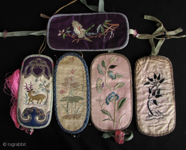 Collection of 5, circa late Qing Dynasty, embroidered glass cases. Eyeglasses were always considered a luxury status item, since not everyone who needed them could afford a pair and they were emblematic  ...