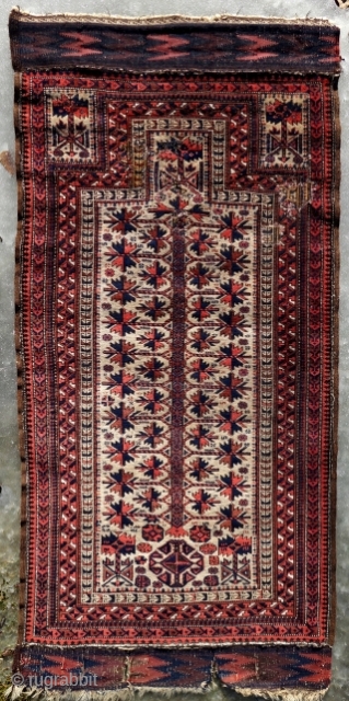 Baluch Prayer Rug.

From the hand of a skilled weaver, a beautifully realized tree rug.

Circa Last quarter of the 19th century.

Fine wool and color.

185x88cm. (6'1"x2'10.5")

Demerits: low pile, repairs and patching.

Formerly in the collection  ...