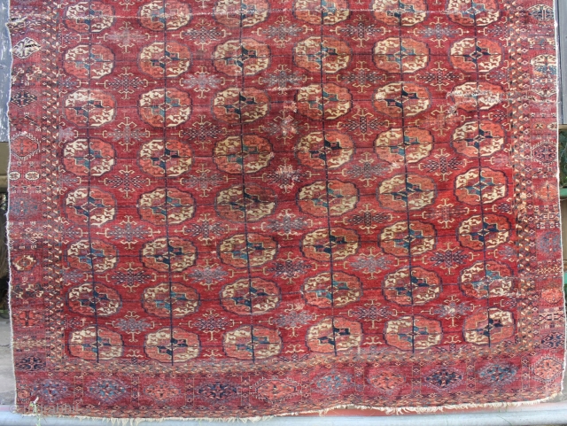 Akhal oasis Tekke around 1800 almost identical copyin book of Elena Tsareva 
Turkmen Carpets page 54 Illustration 28 
with strong signs of use.
Size: 193x188cm         