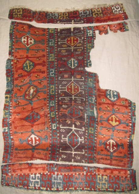 East Anatolian Kurdish Rug, Great Colors, especially the purple ground, Great Wool, blue wefted with traces of brocaded ends at the bottom. Great graphic quality. Very good age, fragmented and mounted. There  ...