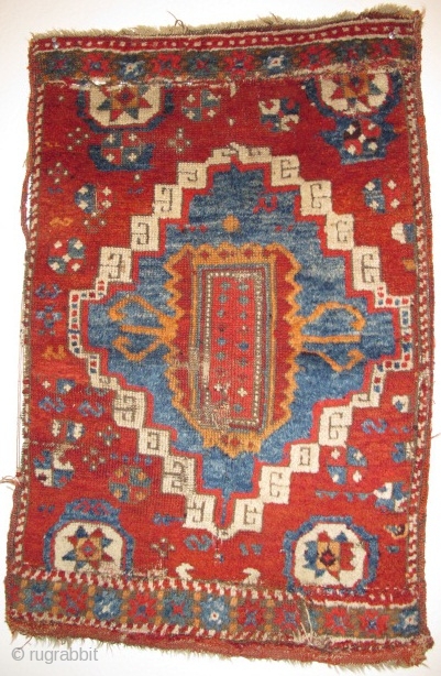 Yastik-shaped East Anatolian pastiche nicely assembled from what must have been a great East Anatolian Sivas? rug. Thick pile, good colors, could use a wash. 33"x22"       