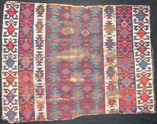 Super Purple Kilim-Design Anatolian Pile Fragment. Old and wonderful with top color. (size is about 4'0"x3'4".) This piece is mounted and conserved against black fabric. (The photo is a bit washed but  ...