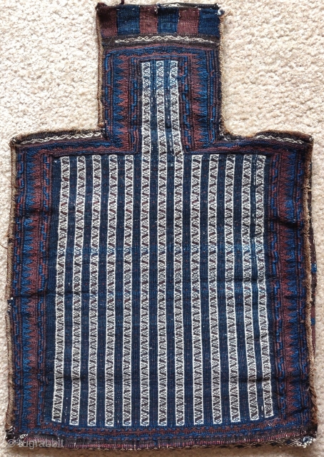 Baluch multi-flatweave technique salt bag with a particularly finely rendered striped weft brocaded field. Not common, a good thing.              