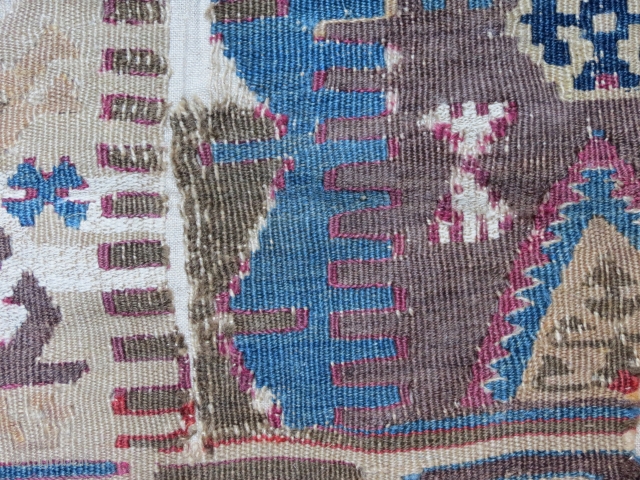 Eastanatolian kilimfragment, interesting coloring, cotton and wool, mounted on linen                       