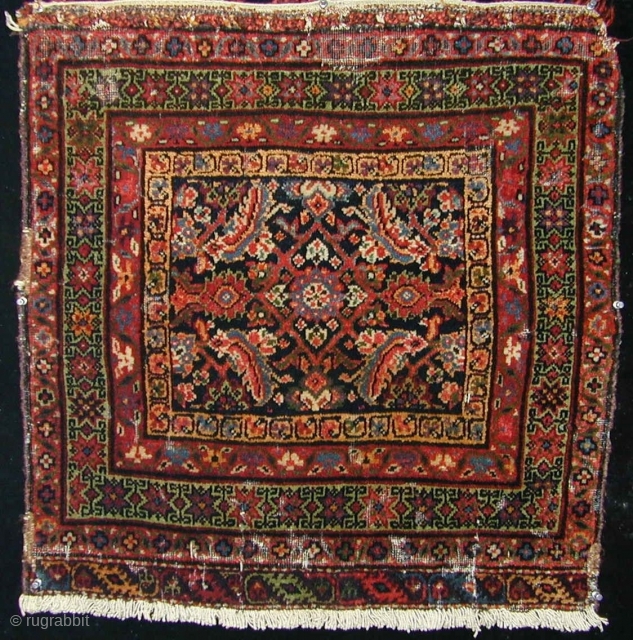 Ferahan bagface, some mothbite, the green ground corroded, as normal for a mid 19th rug, otherwise in clearly collectible condition. Rare to find one of these       