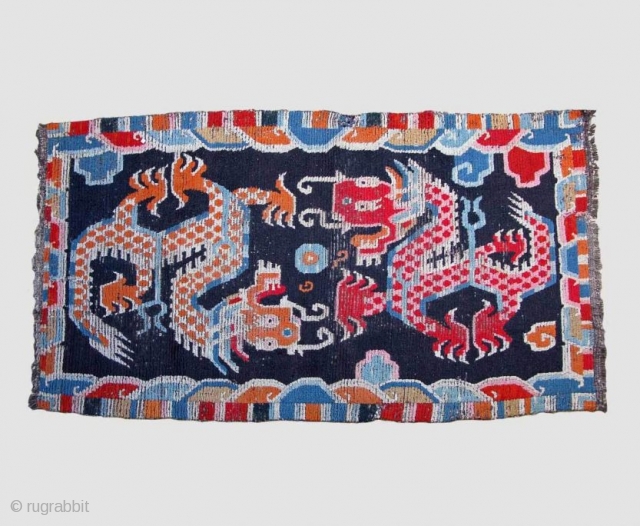 Tibetan Dragon Carpet
86 x 160 cm
Early 20th century
Wool
Central Tibet
A few repairs, beautiful colours, overall appearance good
Feel free to ask for more information, for more textilesand antiques from Asia please visit my website  ...