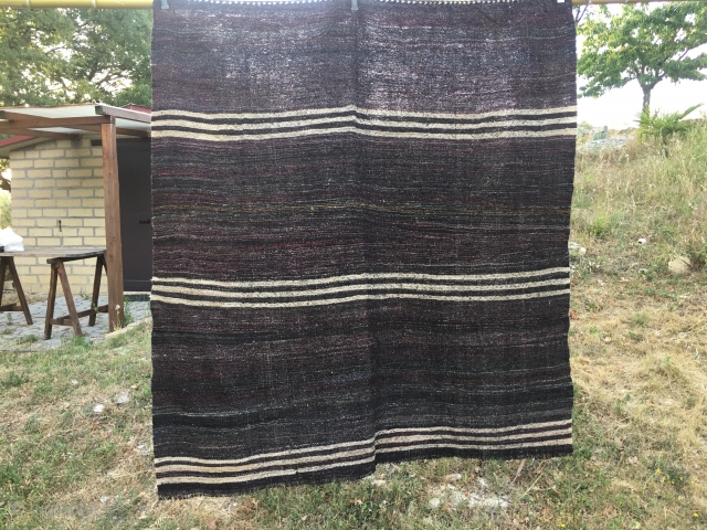 Goat hair kilim. Cm 160x195. Eastern Anatolia. Early to mid 20th century. Squarish in size. Lots of colored wool threads used in the weft. They used to size them according to their  ...