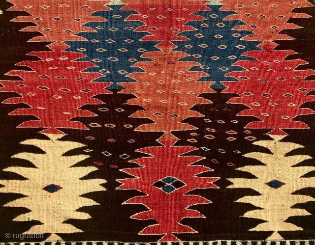 SOLD/TKS
 Khalaj kilim by a Turkic group based south of Isfahan, Iran. Cm 120/200. Datable 1890/1900. Rough, primitive weave with an incredibly modern pattern made of big kind of palmettes that look  ...