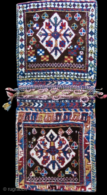 Qashqai collectors item.
This is a very rare and beautiful Qashqai Gabbeh pattern type khorjin/saddle bag. Cm 50x125 ca. Datable back to 100/110 years. The rarity is first of all in the fact  ...