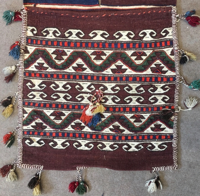Western Anatolia. Bergama area. Bag face of a complete heybe or donkey saddle bag. Hands on hips/elibelinde, power symbols/ram horns, wishes/dileks, etc.....there is everything in this very decorative little donkey bag. See  ...