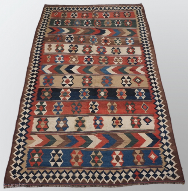 Antique Persian tribal Qashqai kilim, South West Persia. www.knightsantiques.co.uk 
Size: 8ft 4in x 4ft 11in (255 x 151cm).
Circa 1900.

A good Qashqai kilim with a bold banded design, natural dye colours throughout.

Excellent condition,  ...