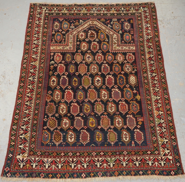 Antique Caucasian Marasali prayer rug of the scarce 'Black' ground colour. www.knightsantiques.co.uk 
Size: 5ft 1in x 3ft 10in. (155 x 118cm)
Circa 1880.

This outstanding rug belongs to a scarce group known as 'Black'  ...