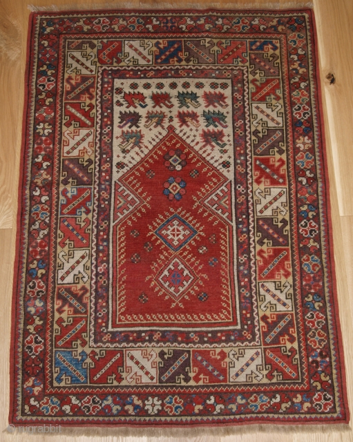 Antique Turkish Milas prayer rug of classic design with superb soft wool and small size. www.knightsantiques.co.uk Size: 4ft 3in x 3ft 0in (129 x 91cm). 

2nd half 19th century.

The rug has very  ...