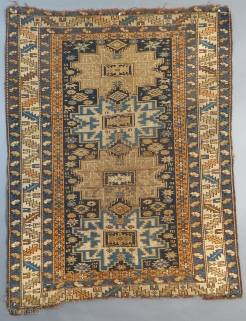 Antique Caucasian Kuba with a Lesghi Star" design.
It dates from around 1900-1915.
It is in fairly good condition with NO holes, tears or stains.
The ends are frayed out and uneven.
It measures 56" X  ...