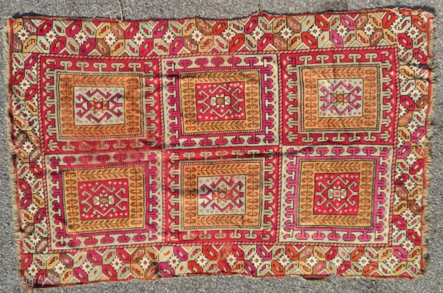 Antique 19th century moroccan carpet. Possibly Rabat.

Rare to find such an old piece. Clear ottoman influence.

Part of the shirazi and ends kilims are still in place.

199 x 120 cm
    