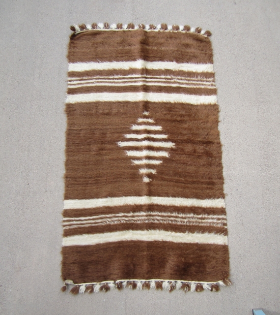 Child's Siirt blanket.....Southeast Anatolia ....mid 20th C....angora goat hair on cotton string....very unusual ....Dowry piece in un-used condition...
3'x 5'3" ( 90 x 160cm )         