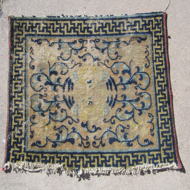 Chinese.....18th Century...28" x 29" (71cm x 74cm )....missing one end , with
overall low pile .....opposing Phoenixes in center , but they are difficult to see ....condition as shown and priced accordingly.   ...