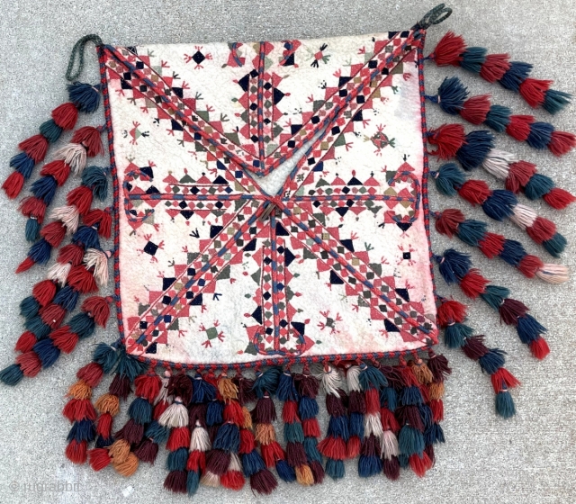 Early 1900s Yomut felt bokche. In great condition minus a few red runs near the border. 1'10" x 2'0".              