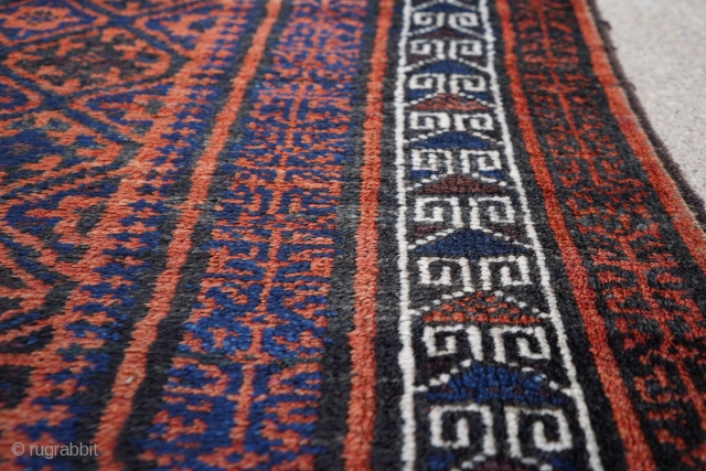Really soft older Baluch rug or runner about 4ft x 8ft. It has really soft wool. It's in full pile with one spot near a corner with a couple knots missing. The  ...