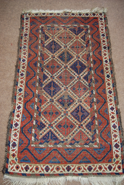 Old Baluch rug, 74 x 132 cm, traces of use                       