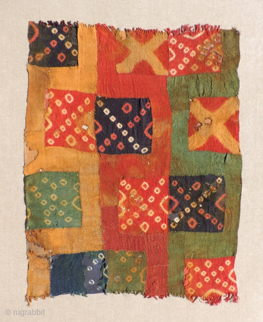 Pre-Columbian tie dye panel, Wari Culture, A.D. 600 - 900.  Size: 25 x 33 inches.  This textile has a colorful and interesting combination of tie dye patterns woven in discontinuous  ...